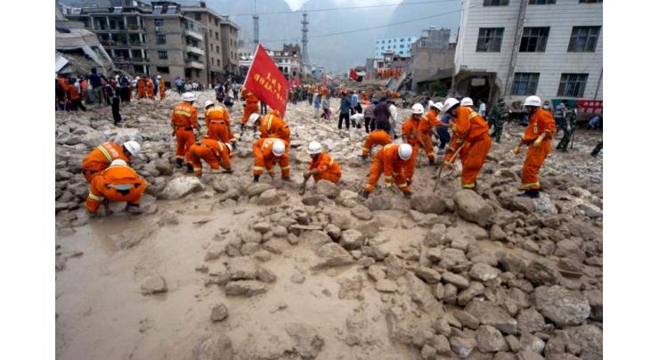 11 died and 12 missing due to land sliding in China
