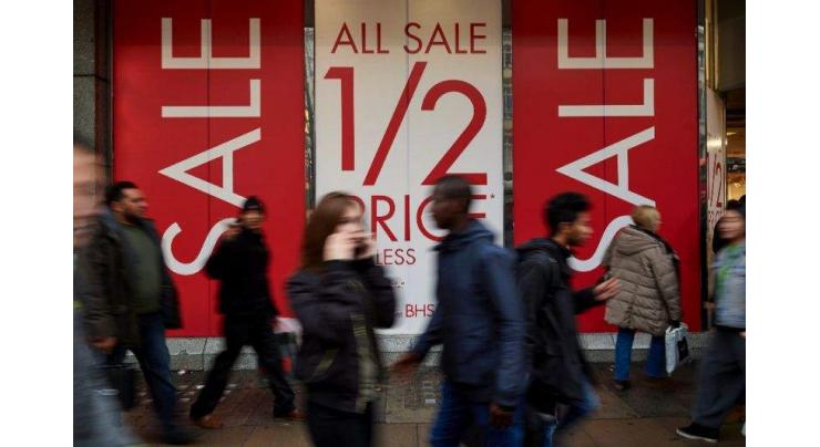 Britain's retail sales recoil on bad June weather