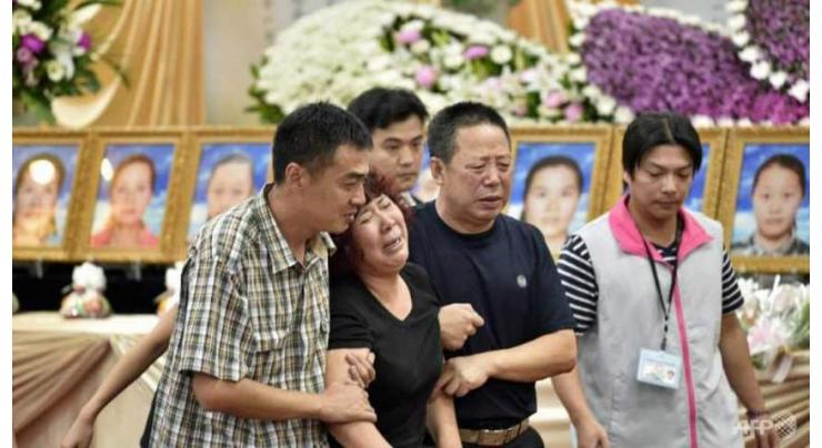 Chinese relatives demand truth about tourist bus inferno