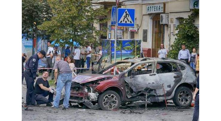 Journalist killed in Kiev car bombing buried in Belarus
