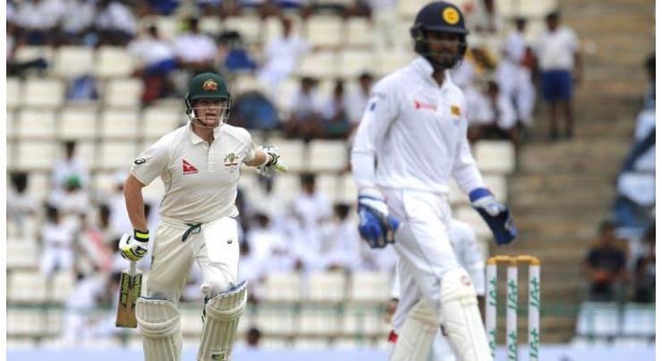 Cricket: Aussie openers ram home advantage over Lankans
