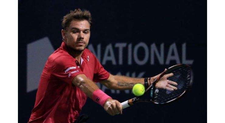 Tennis: Wawrinka tested in two-hour tussle with Youzhny