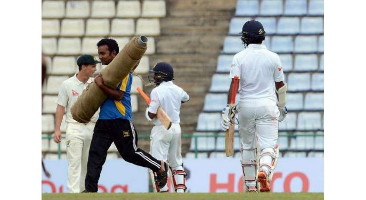 Cricket: Aussies in command as rain halts Lanka Test