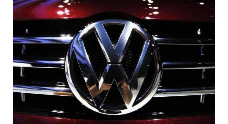 Volkswagen says net profit falls 57% in second quarter