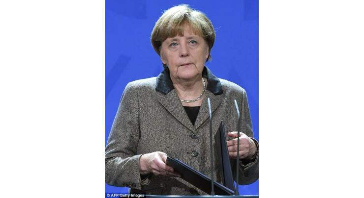 Merkel 'firmly' rejects reversing refugee policy after attacks