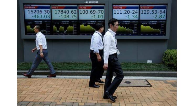 Tokyo shares up despite BoJ stimulus disappointment