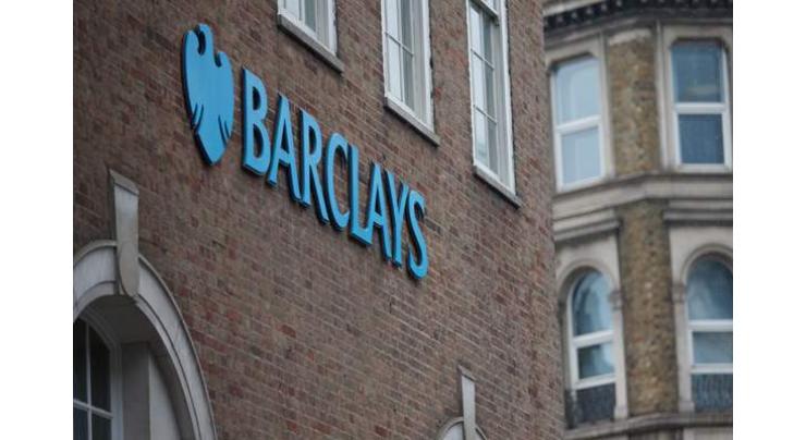Barclays posts sliding first-half profits