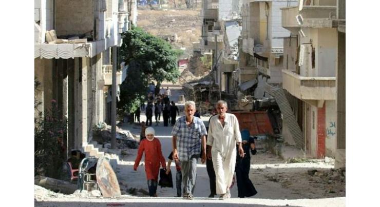 'Dozens of families' leave besieged Aleppo: Syria state news
