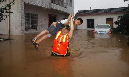 Nearly 300 dead or missing from China flooding: media