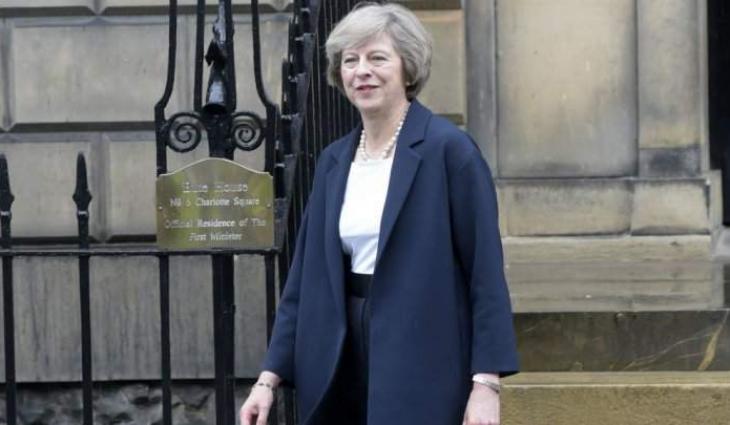 Britain's May heads to France for Brexit talks