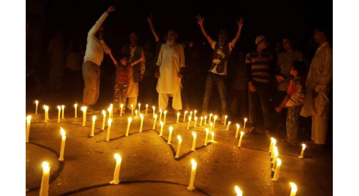 People take out candle light March in Sopore
