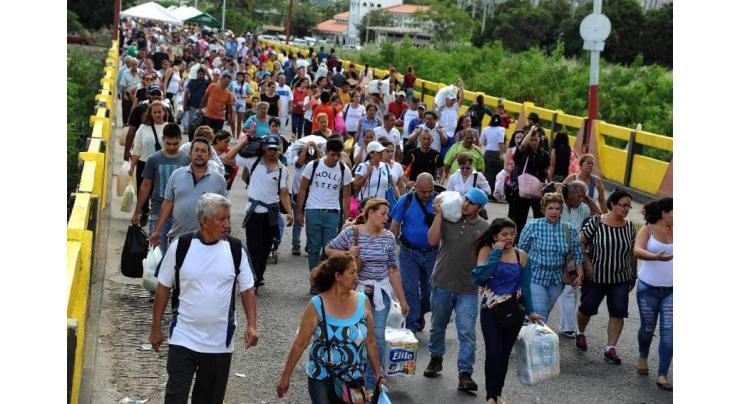 Colombia adopts measures to battle migrant crisis