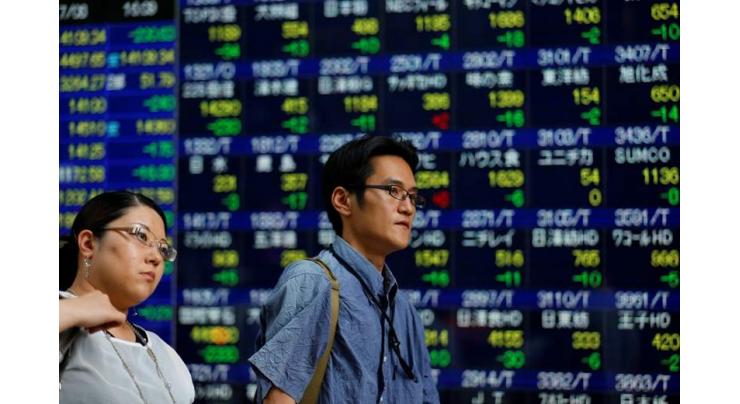 Tokyo shares down by break after rally fizzles