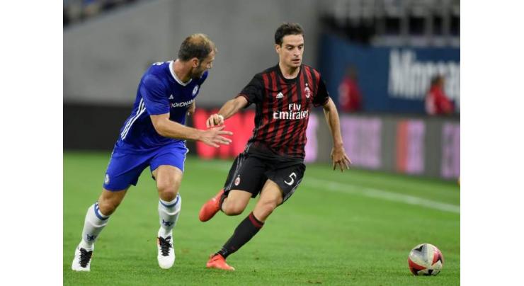 Football: Chelsea thump AC Milan 3-1