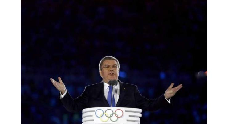 Olympics: IOC chief urges unity in 'world of crises, mistrust'