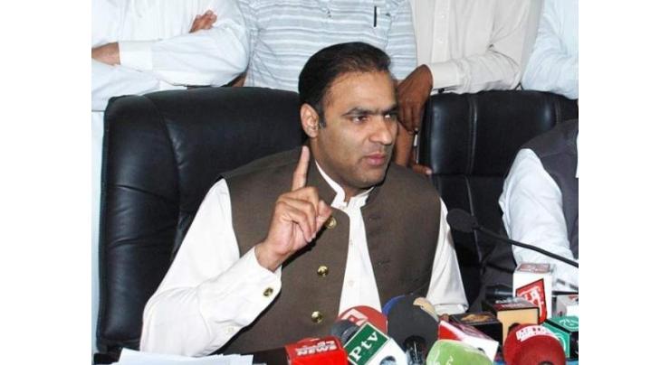 Abid Sher presents compensation cheques to victims' families