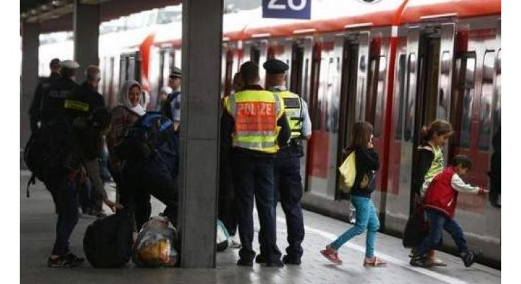 Two Belgian police hurt by machete-wielding assailant shouting 'Allahu akbar'