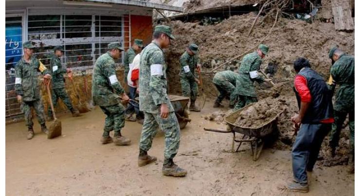 Mexico landslides leave 11 dead as new storm forms