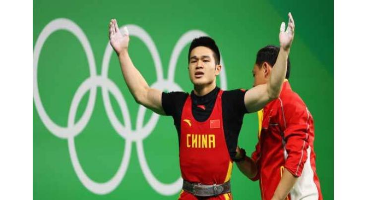 Olympics: China's Shi wins men's 69kg weightlifting gold
