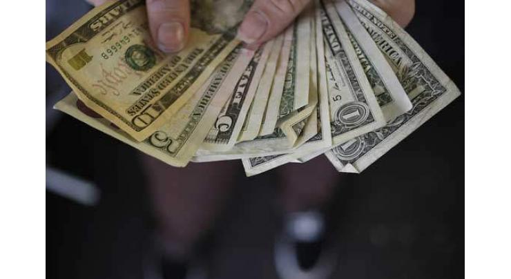 Dollar hit by disappointing US data