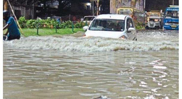 Heavy downpour inundates city areas