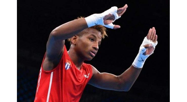 Olympics: Cuban boxing prodigy secures first medal