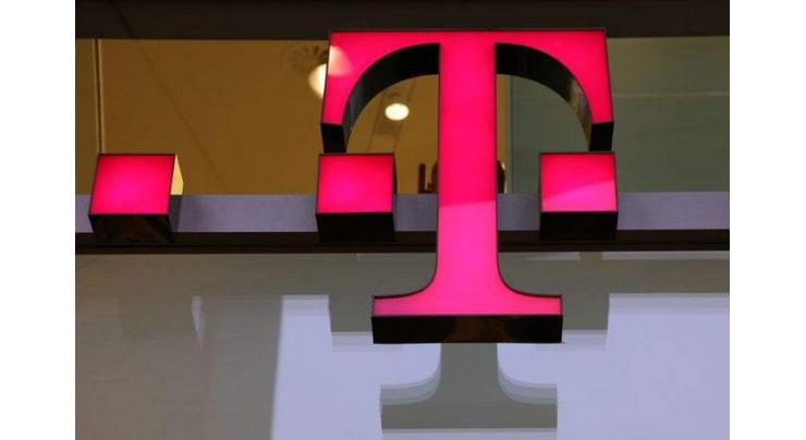 Deutsche Telekom sees profits fall on big charges