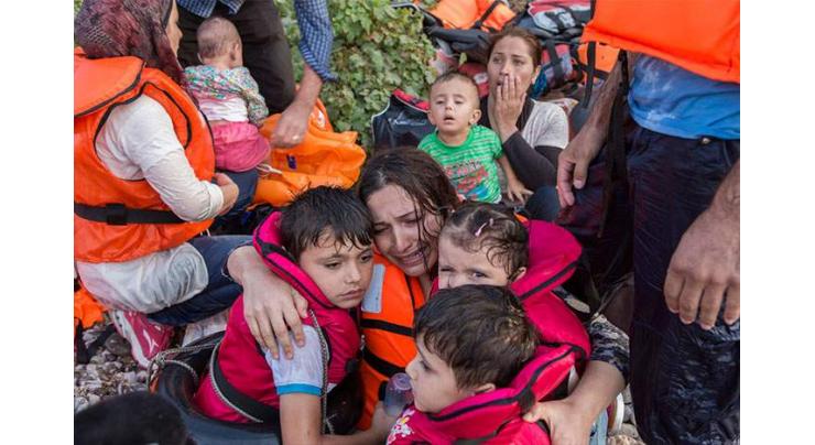 UN chief urges all countries to help refugees & migrants -- build bridges, not walls