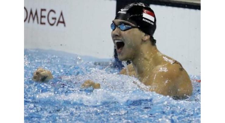 Olympics: Schooling upsets Phelps to win Singapore's first ever gold