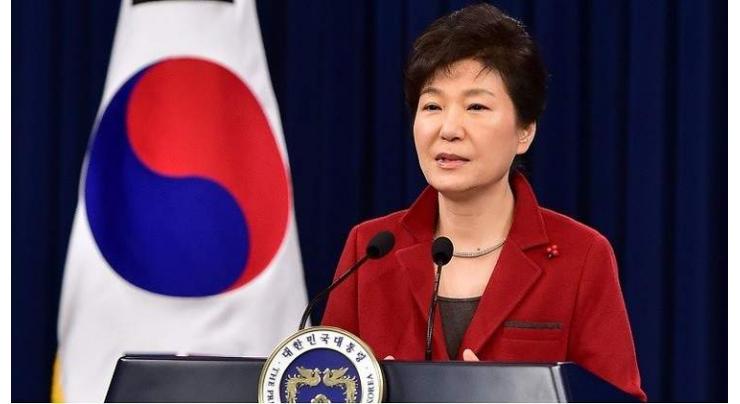 S. Korea's Park defends missile shield as residents shave heads