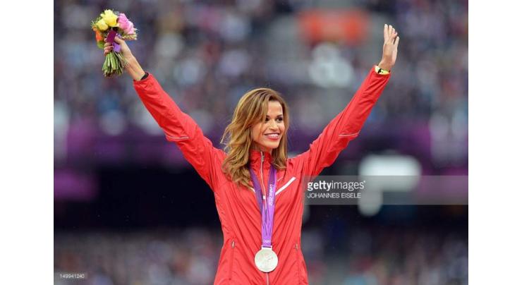Olympics: Women's athletics 3000m steeplechase podium