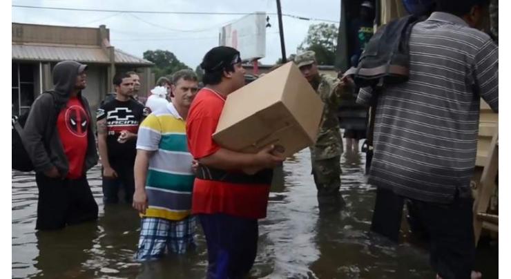 Seven dead, 30,000 rescued in record Louisiana floods