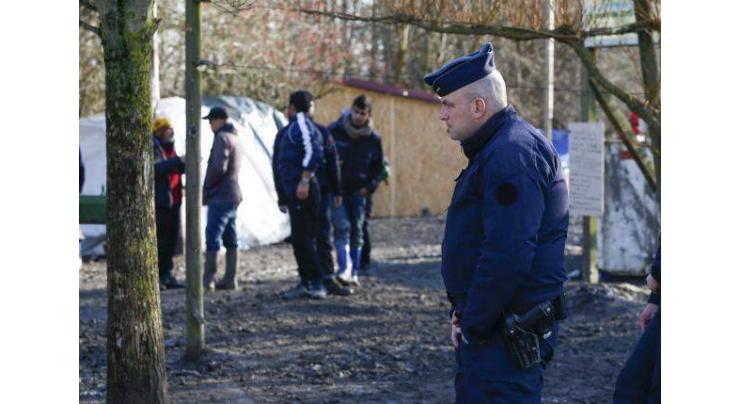 Two men wounded in French migrant camp shooting