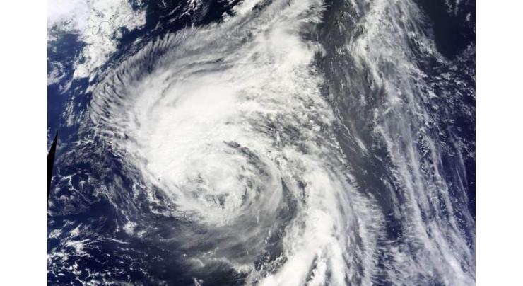 Tropical storm hits Japan's northeast, hitting transport