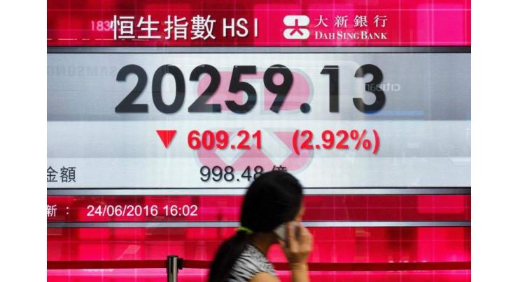 Shanghai stocks slip at open, Hong Kong up