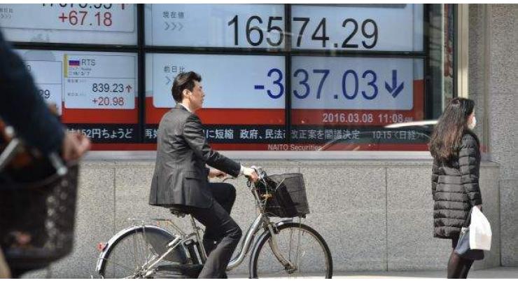 Tokyo shares open down as stronger yen hits exporters