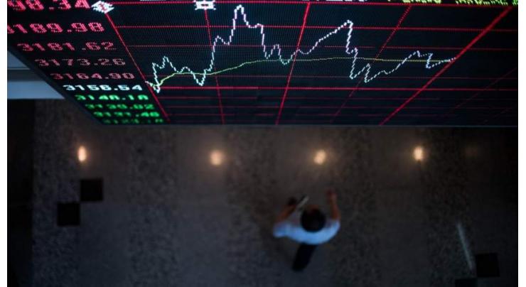 Hong Kong stocks finish up but Shanghai slips