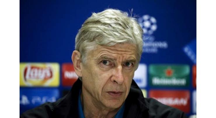 Football: Wenger adamant he's ready to spend
