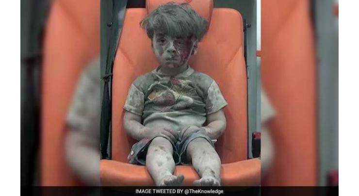 Russia denies its strikes hit Syrian boy in photo