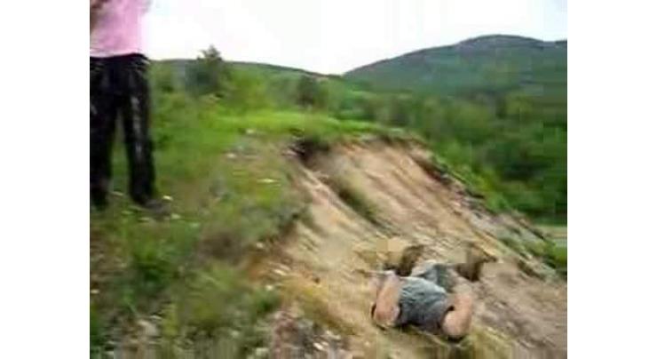 Laborer dies after falling from hill