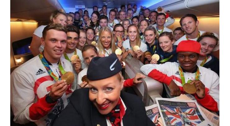 Olympics: Triumphant Brits return home in gold-nosed plane