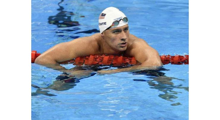 Olympics: Swimmer Lochte charged over false robbery claim