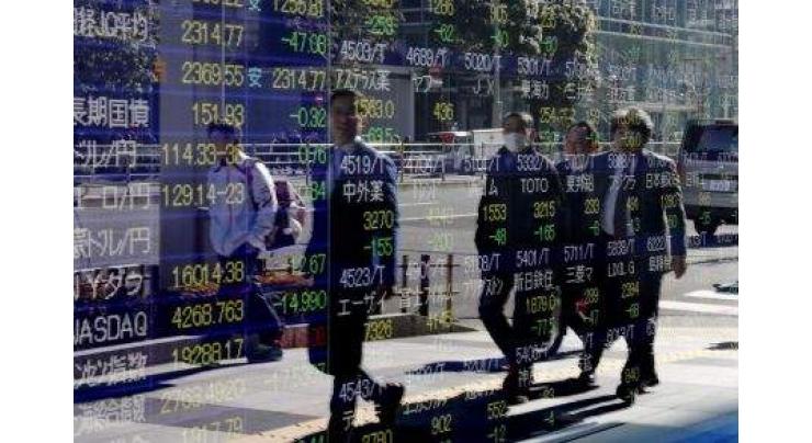 Tokyo shares open lower despite Wall Street gains