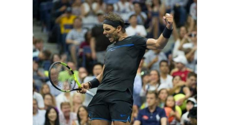 Tennis: Brief encounter as Djokovic wins in 32 minutes, Nadal breezes 