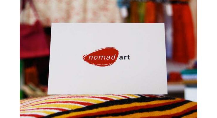Nomad holds evening with American portrait photographer 