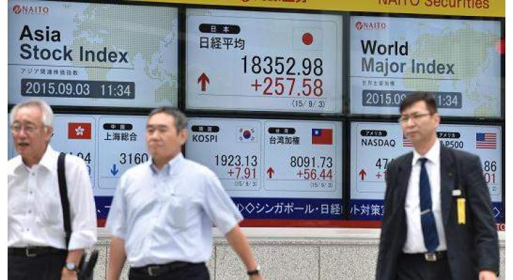 Tokyo shares slump by break on US rate hike talk 