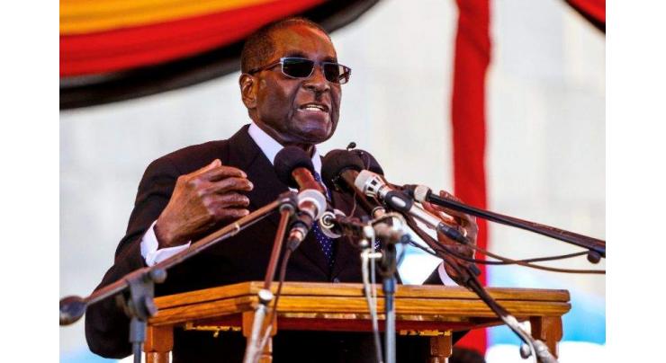 Mugabe statue mocked, but president happy 