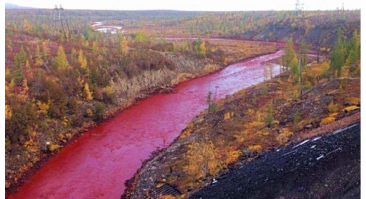 Russian metals giant admits red river leak 