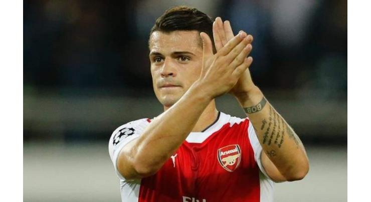 Football: Xhaka's time will come at Arsenal, says Wenger 
