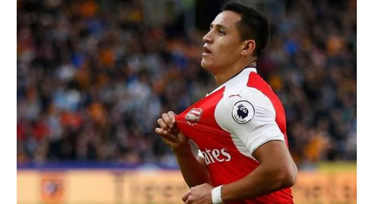 Football: Sanchez inspires Arsenal rout of 10-man Hull 